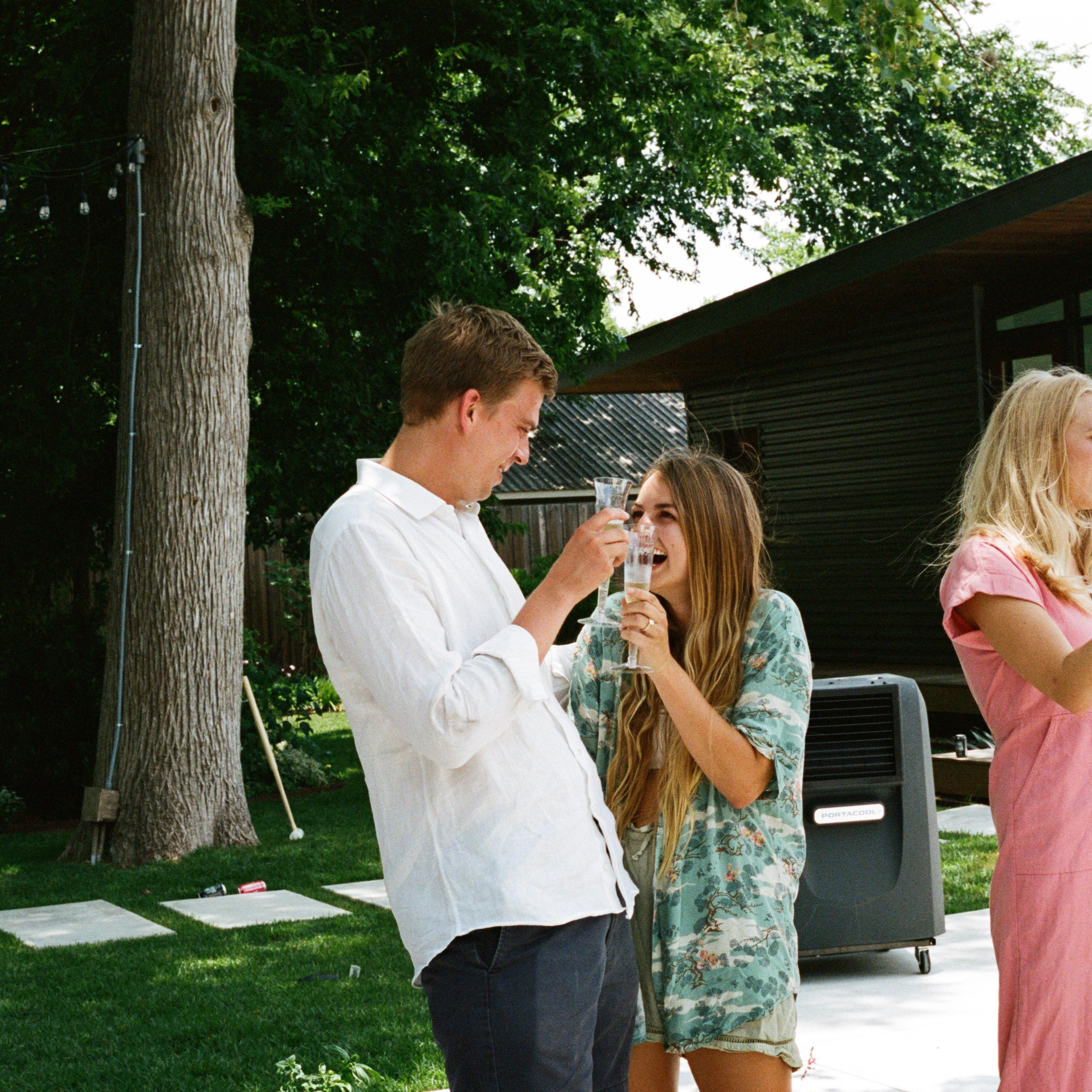 toasting with all of our friends post-proposal