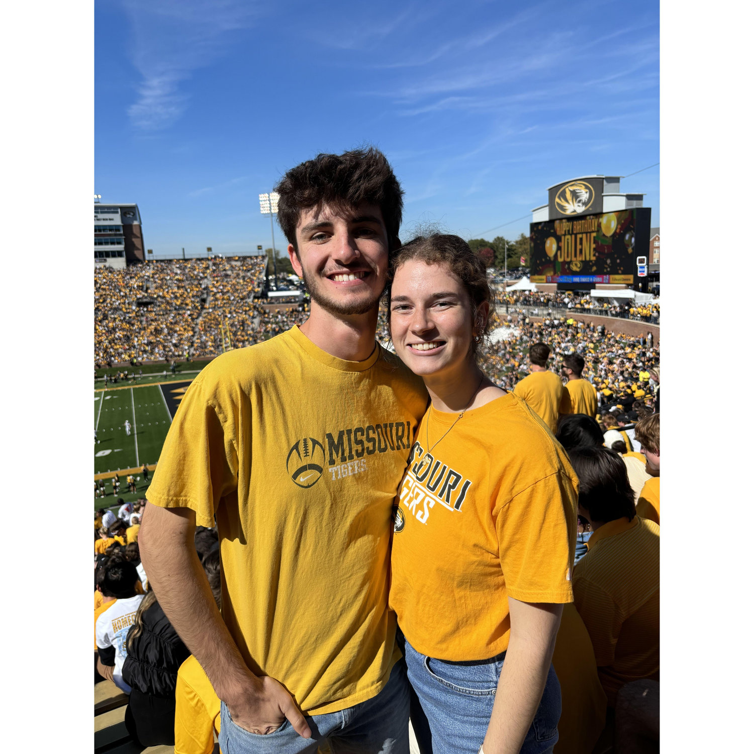 Christine and Zach at a Mizzou football game, their alma mater.