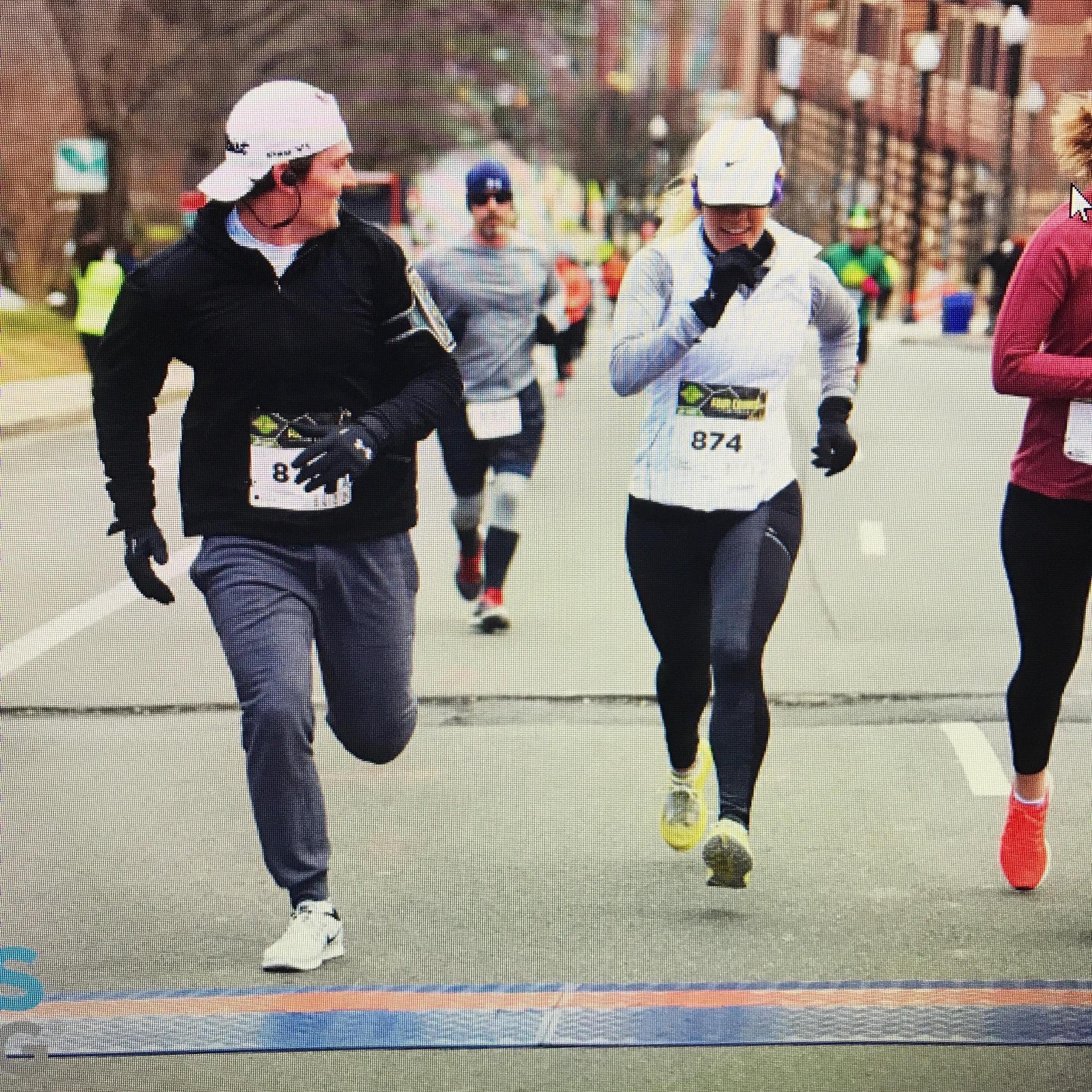 A well positioned photographer at the end of the race captured Andrew's shock as I attempted to sprint past him at the finish line.