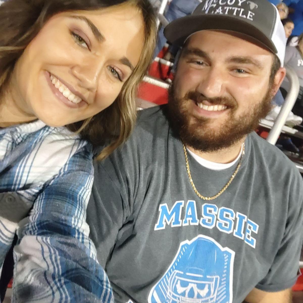 Our first picture and Raegan's first football game! Go Falcons!