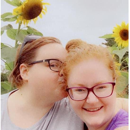 Sneaking a smooch in the sunflowers at Bernheim.