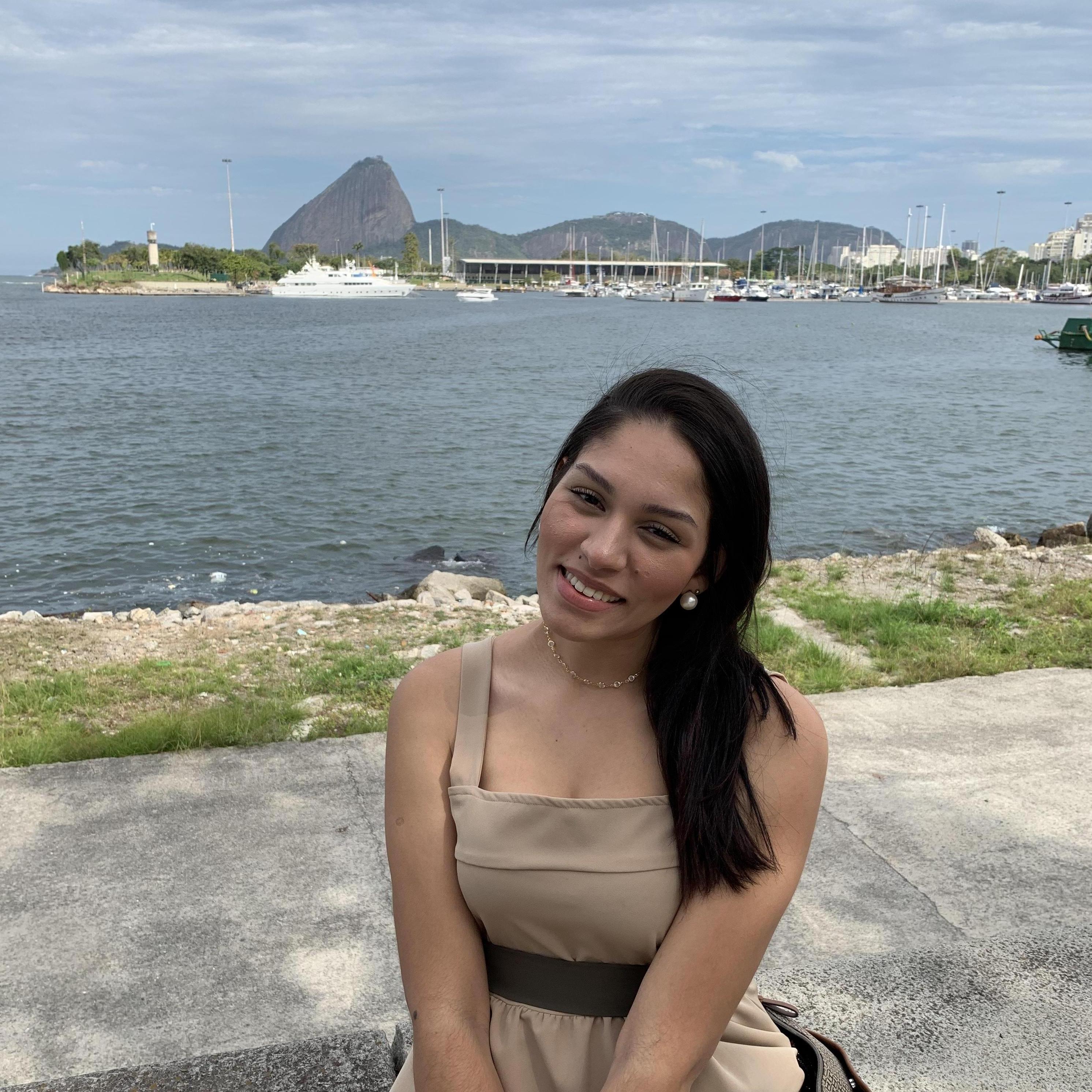 Ana making a lovely pose in our trip to Rio de Janeiro. Check out the famous Pão de Açúcar (Sugarloaf Mountain) in the background!