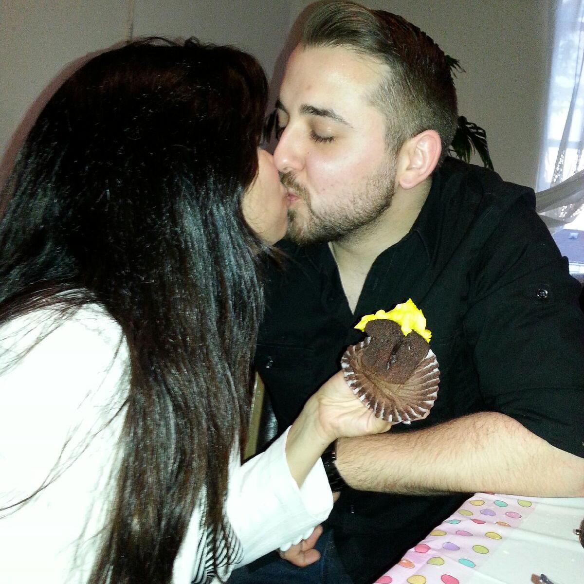 Kissing and eating cupcakes at Lola Grace's 1st birthday party!