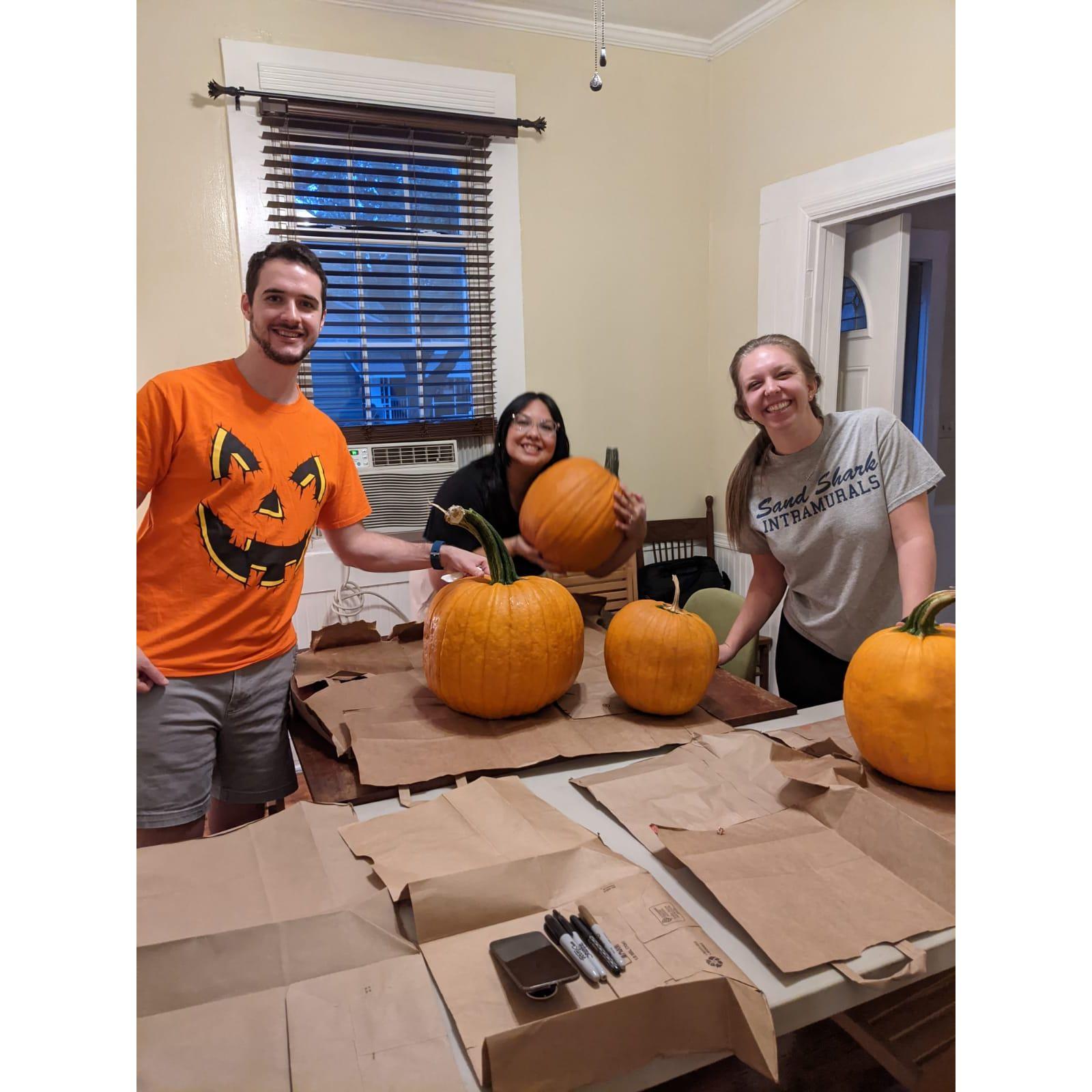 Carving pumpkins with our neighbors, Steve and Chloe!