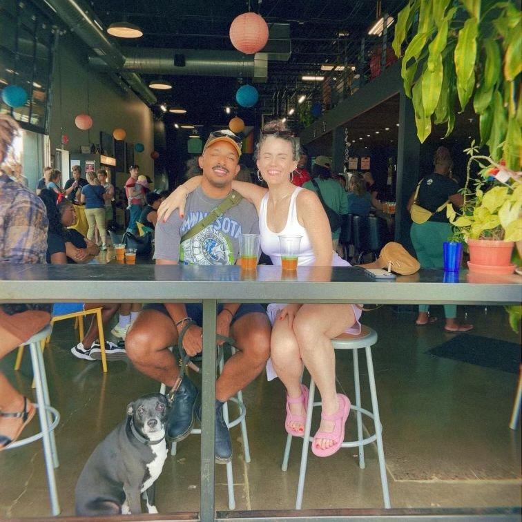 with our Poji pup at our favorite brewery up the street from our house