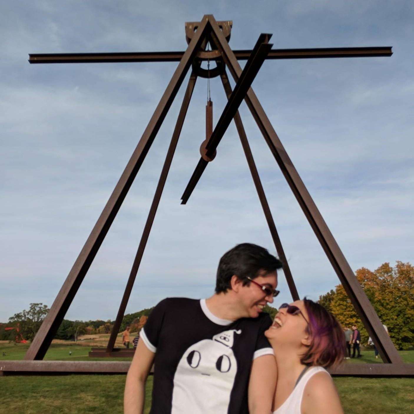 A laugh under an outdoor sculpture at Storm King, NY.