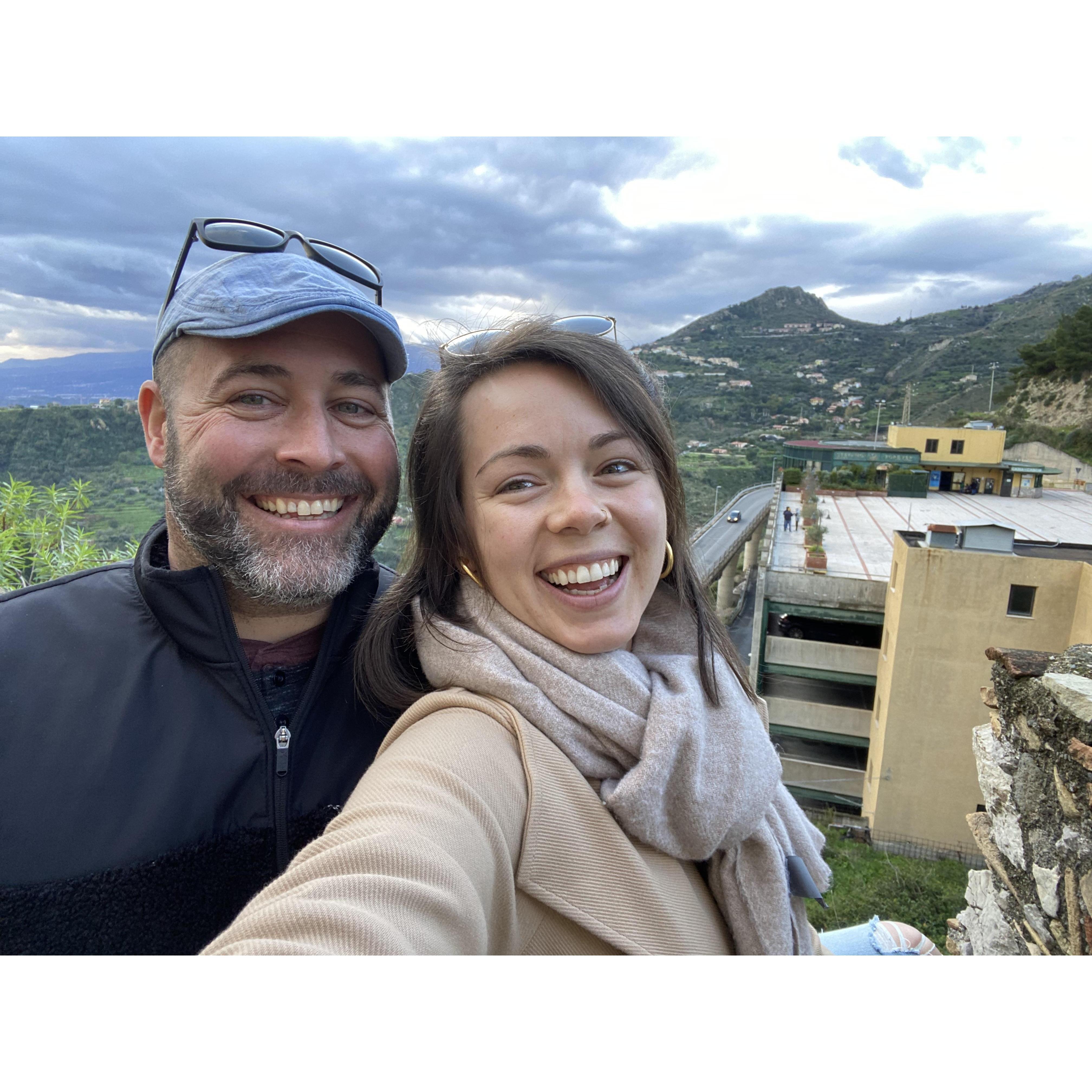Post-engagement, so happy! In Taormina observing Mt. Etna, an active volcano overlooking Sicily.