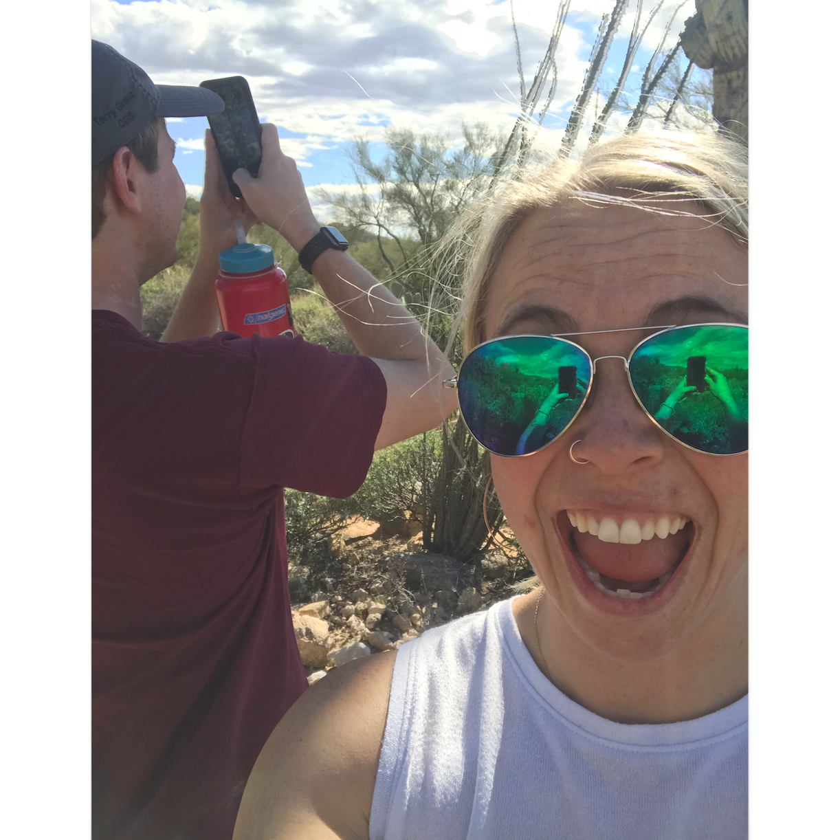 RJ taking pictures of nature, Bryn taking pictures of RJ.