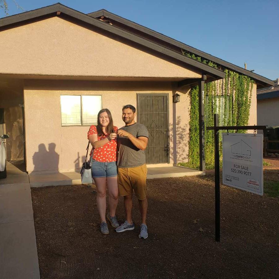 Here we are getting the keys to our first home!