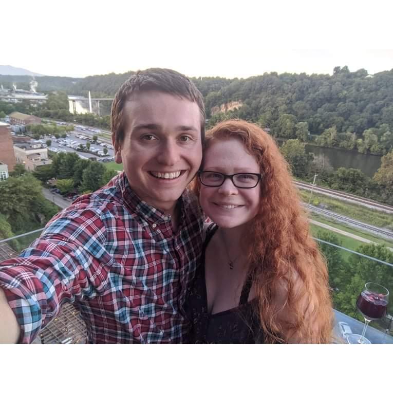 Celebrating 8 years together atop the new rooftop bar overlooking the James River (August 2021)