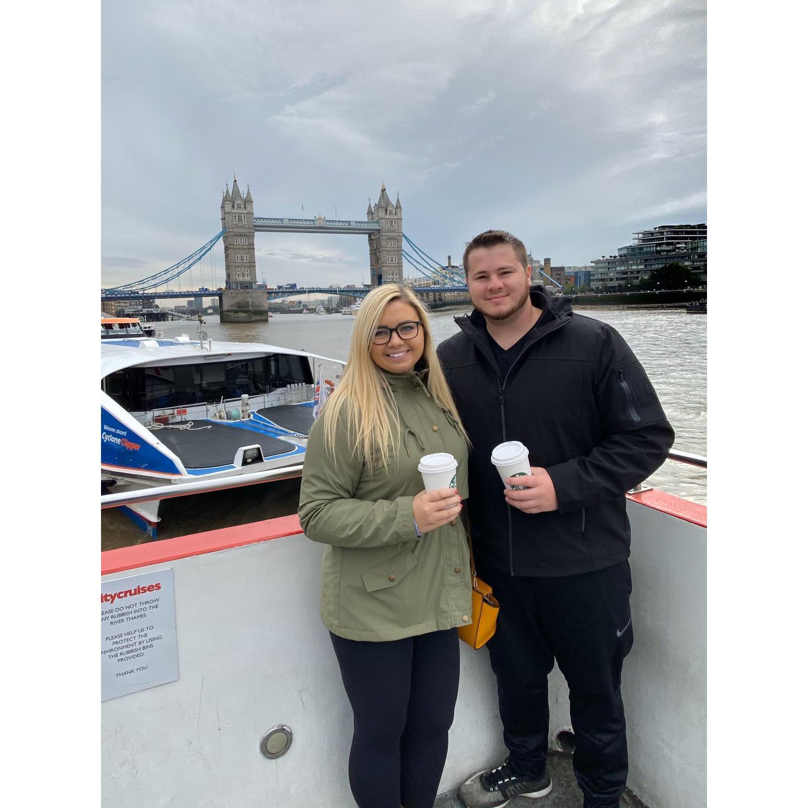 First time in London, Tower Bridge behind us on a boat on the Thames River.