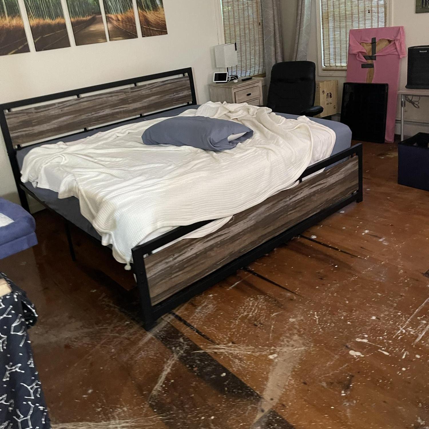 ServPro ripped out all carpeting without removing furniture!