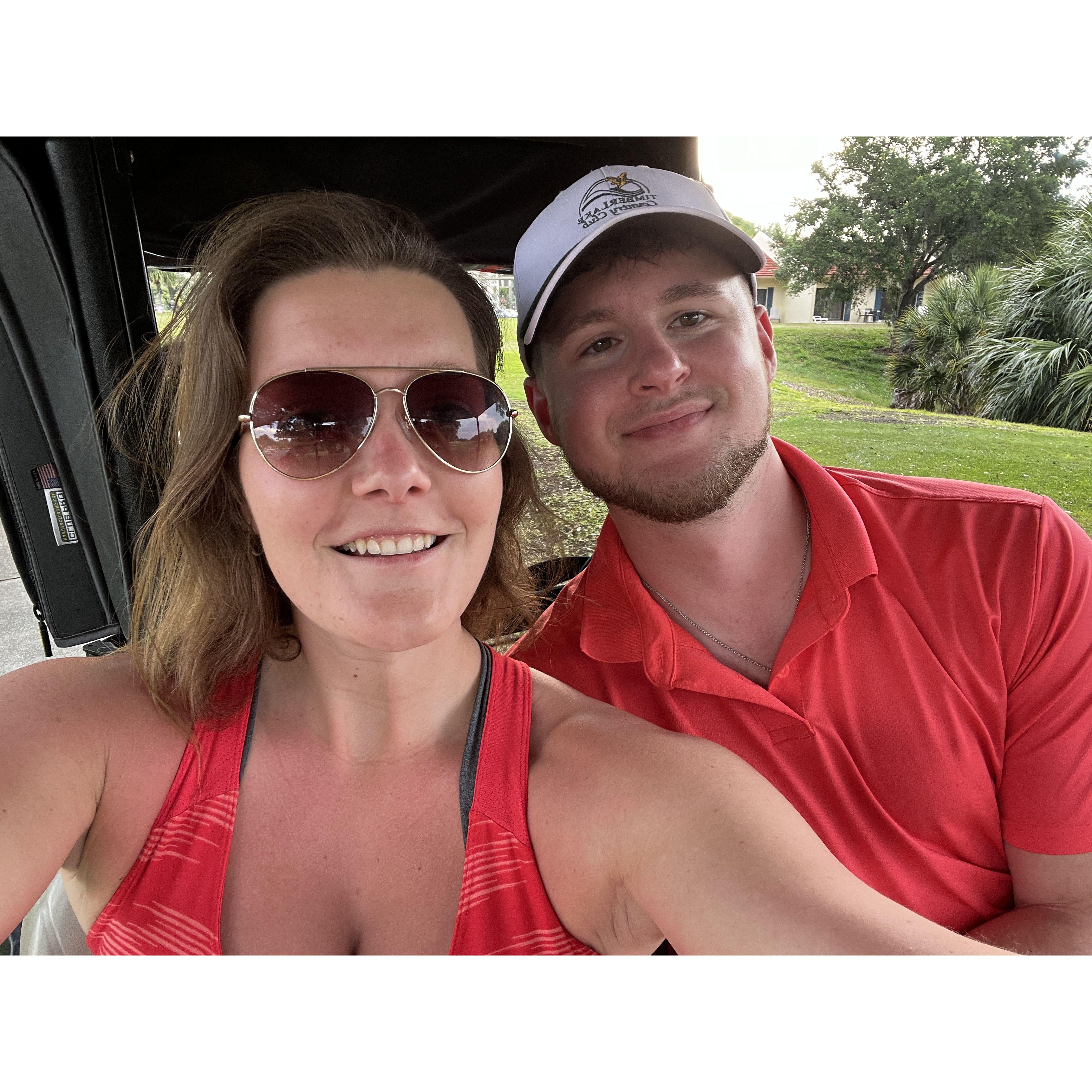 Golf cart photo in Florida! We are working on building up our proficiency to play golf together regularly when married!