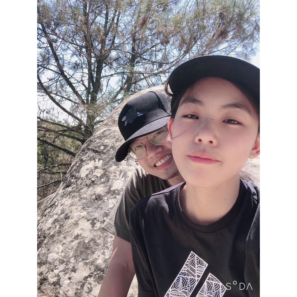 Took a picture together after a hiking date when we were first getting to know each other.