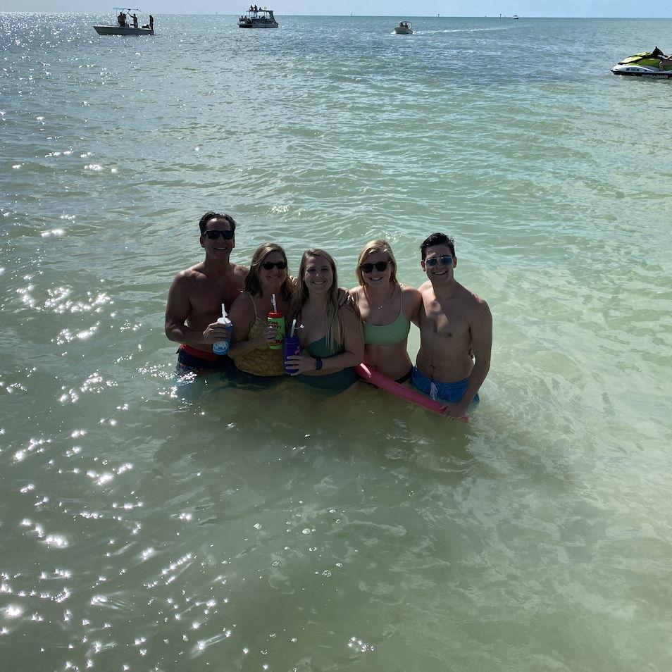 Jessie's first time on a Pugh family trip. A fun vacation to Key West, FL. This photo was taken at a sand-bar stop during a tiki boat tour.