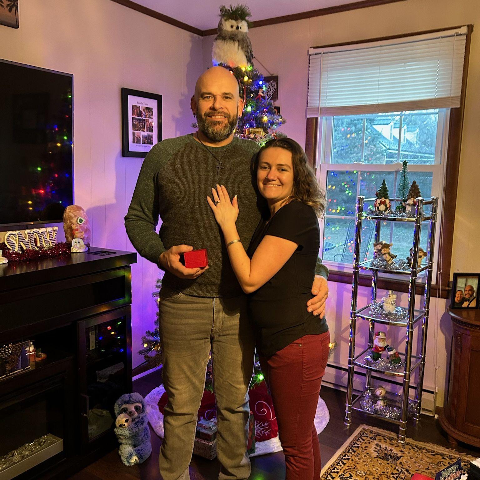 We had this picture taken right after Frank proposed at Christmas Dinner in front of our family!