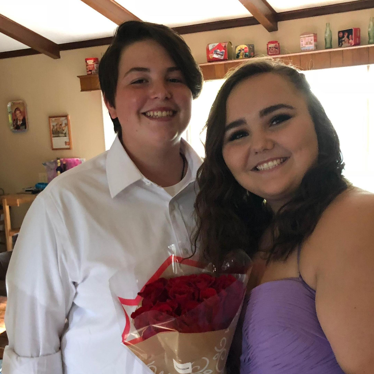 We went to separate schools for our proms, so all our friends got together to have our own. Pictured here we had just gotten all dressed up to go eat at the fanciest dinner... Wendy's!
