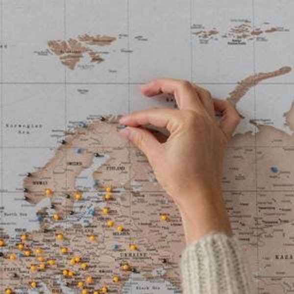 Push pin travel map to mark the places we have travelled to together and plan future trips