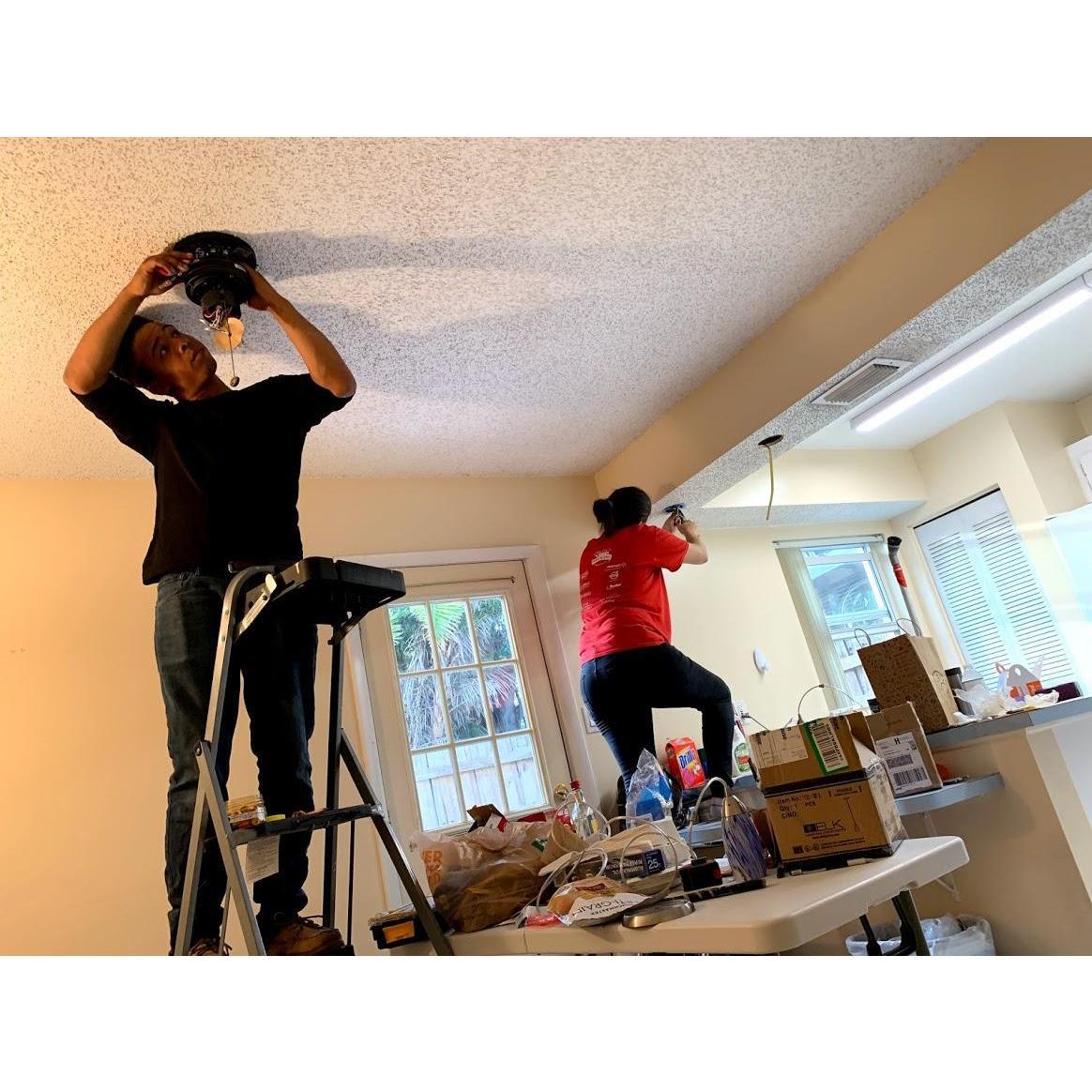 Vaughn and I love working on projects together! Here we can be seen installing lights at my parent's townhouse.