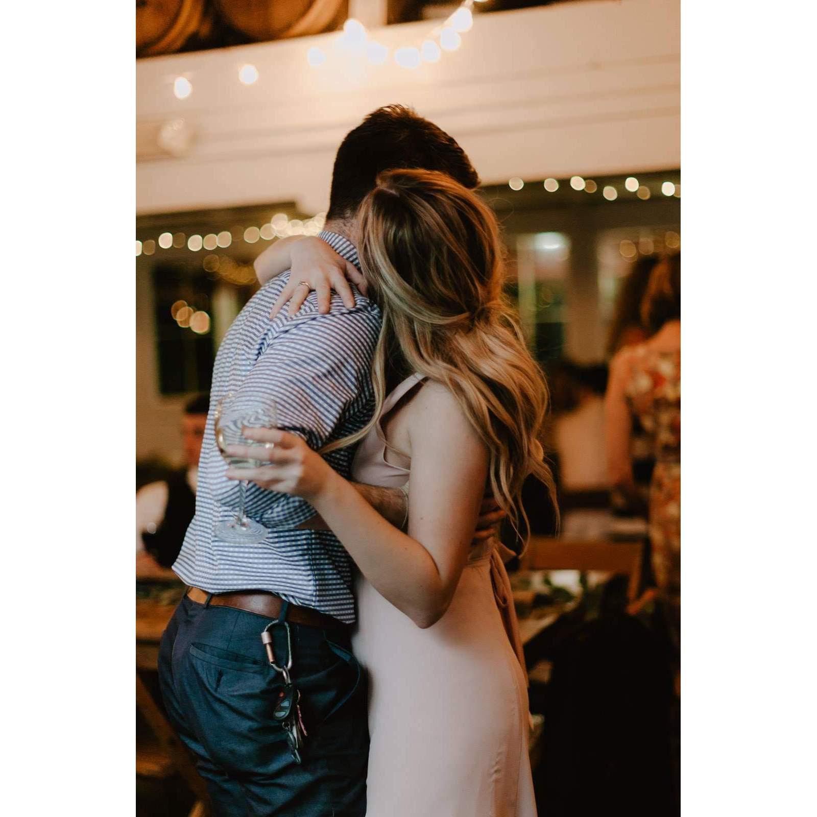 Jake and Olivia dancing at her MOHs wedding