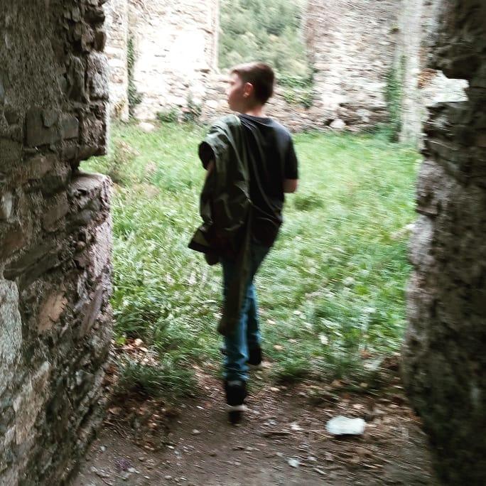 Hayden exploring an abandoned church in Ireland with me.