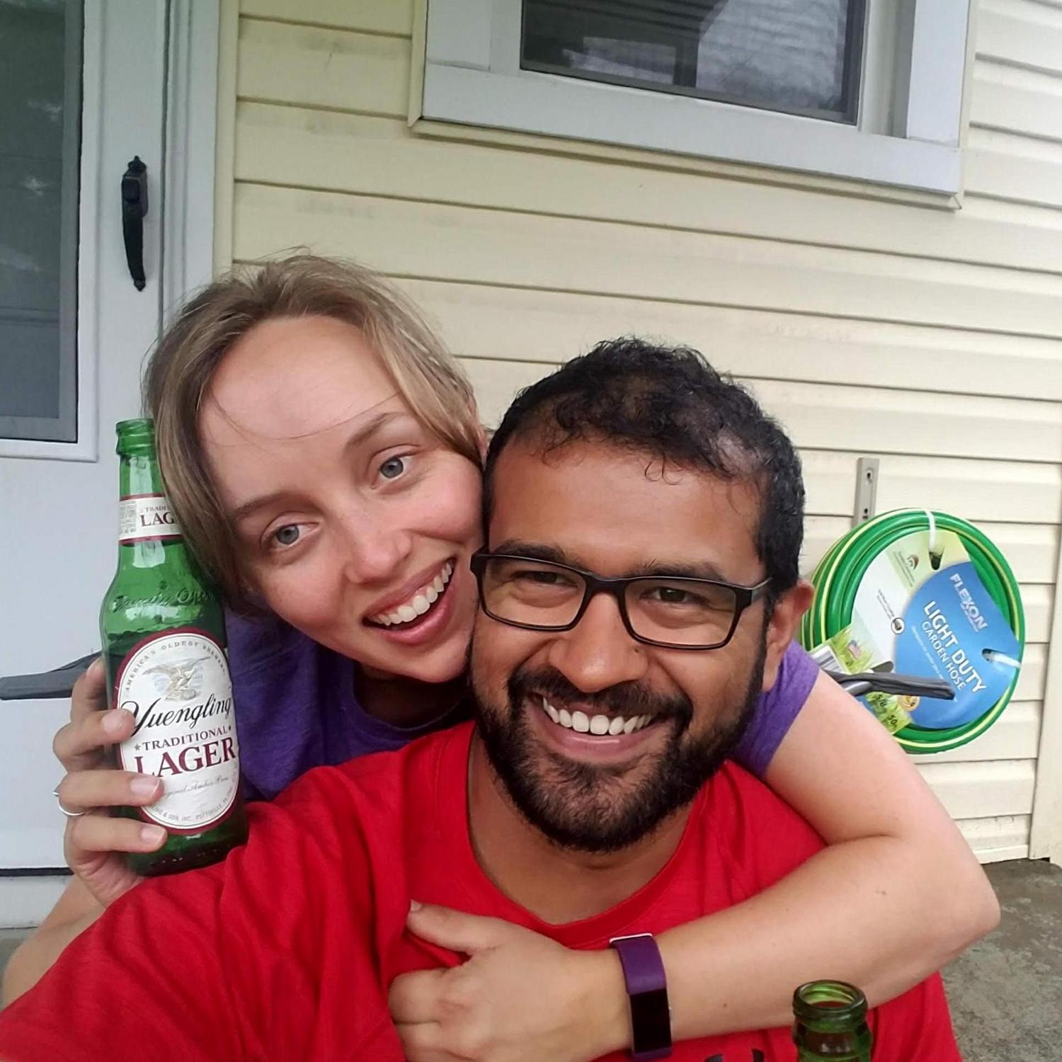 In the summer of 2018, we moved in together. Here we are celebrating after mowing our new lawn for the first time!