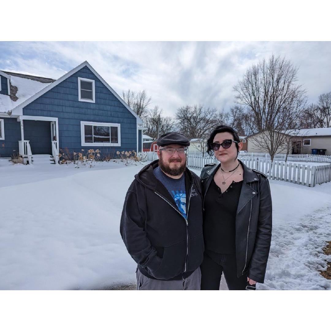 Taken after the walk through of what would become their new home! Lauren didn't let the snowy weather deter her from feeling warm and fuzzy!