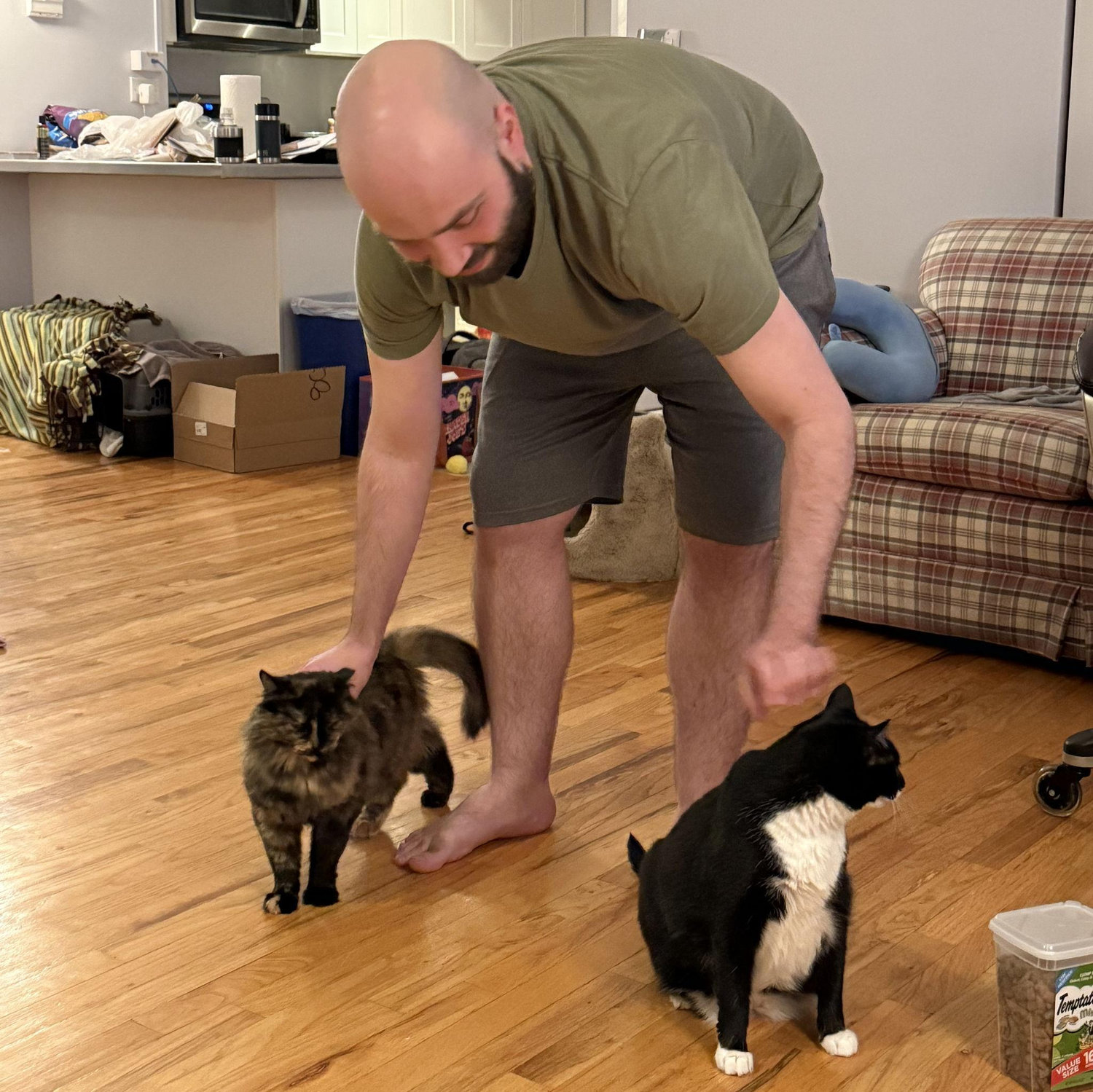 Evan petting his ladies, Claudia and Stella!
