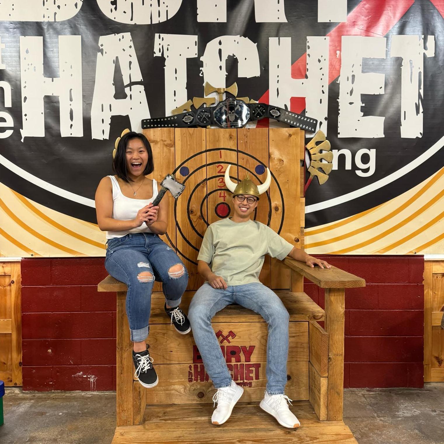 Axe throwing. Can you guess who had better aim?
