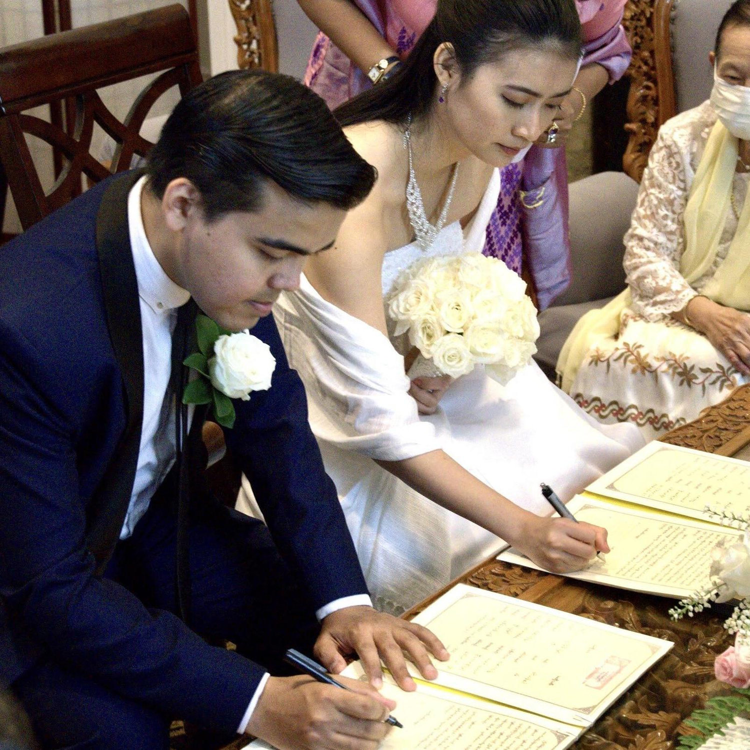 Signing our Burmese marriage certificates. Washington, DC. Aug 21,2020.
