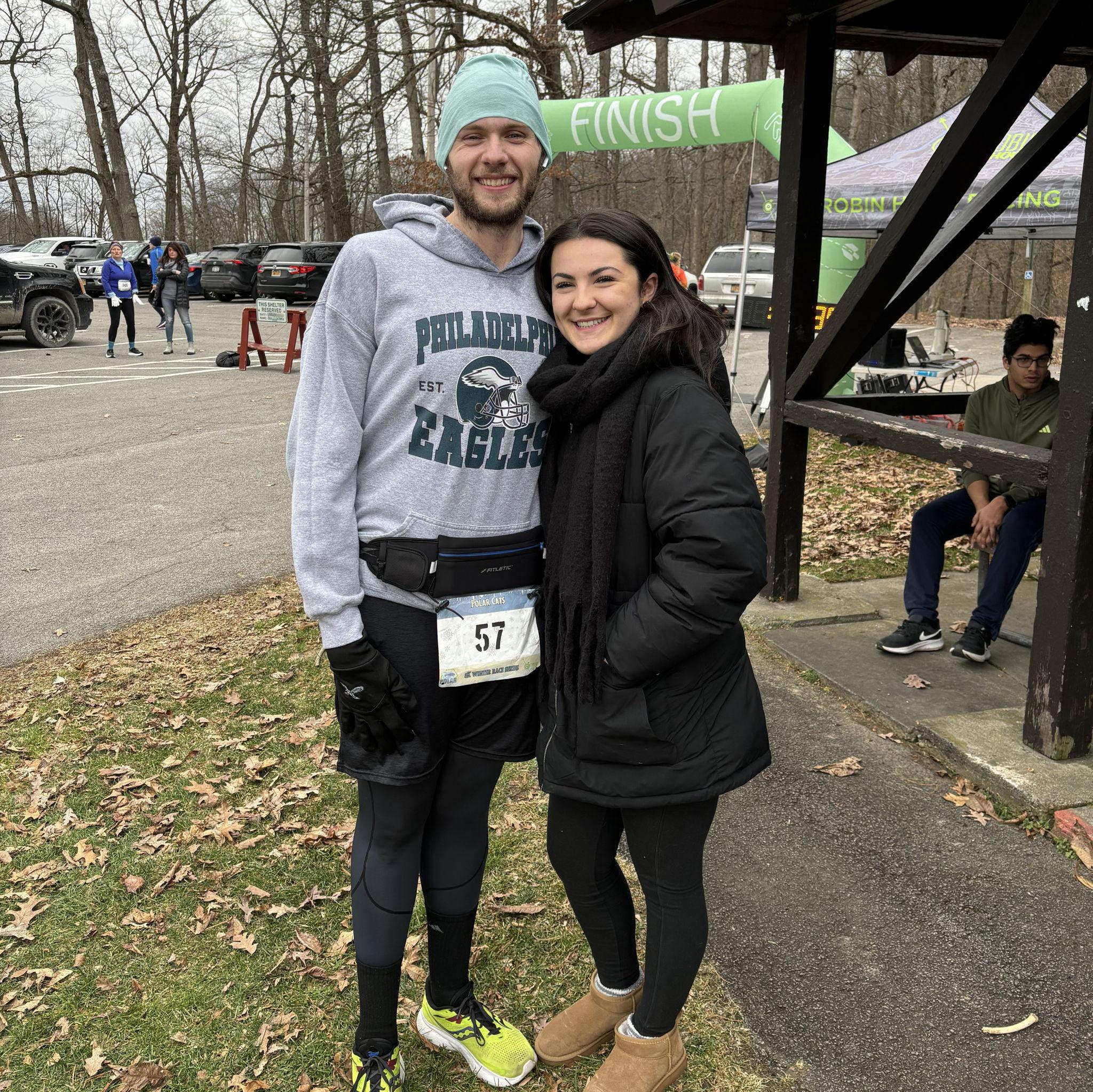 When Katie surprised John at the finish line!