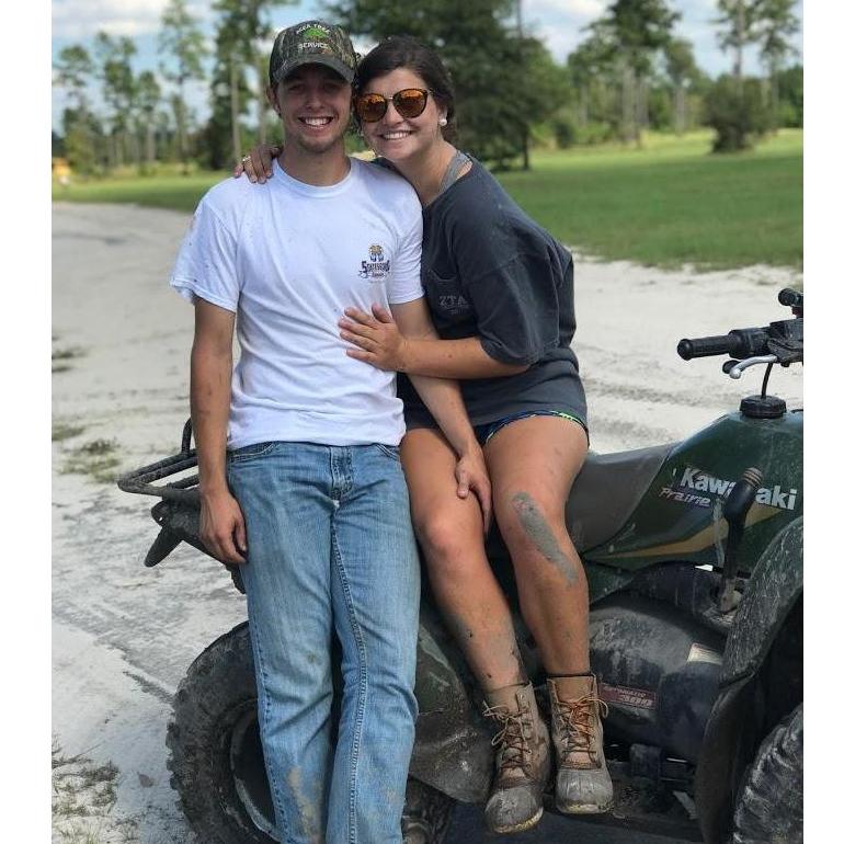 Austin showing his city girl how to have fun in the mud