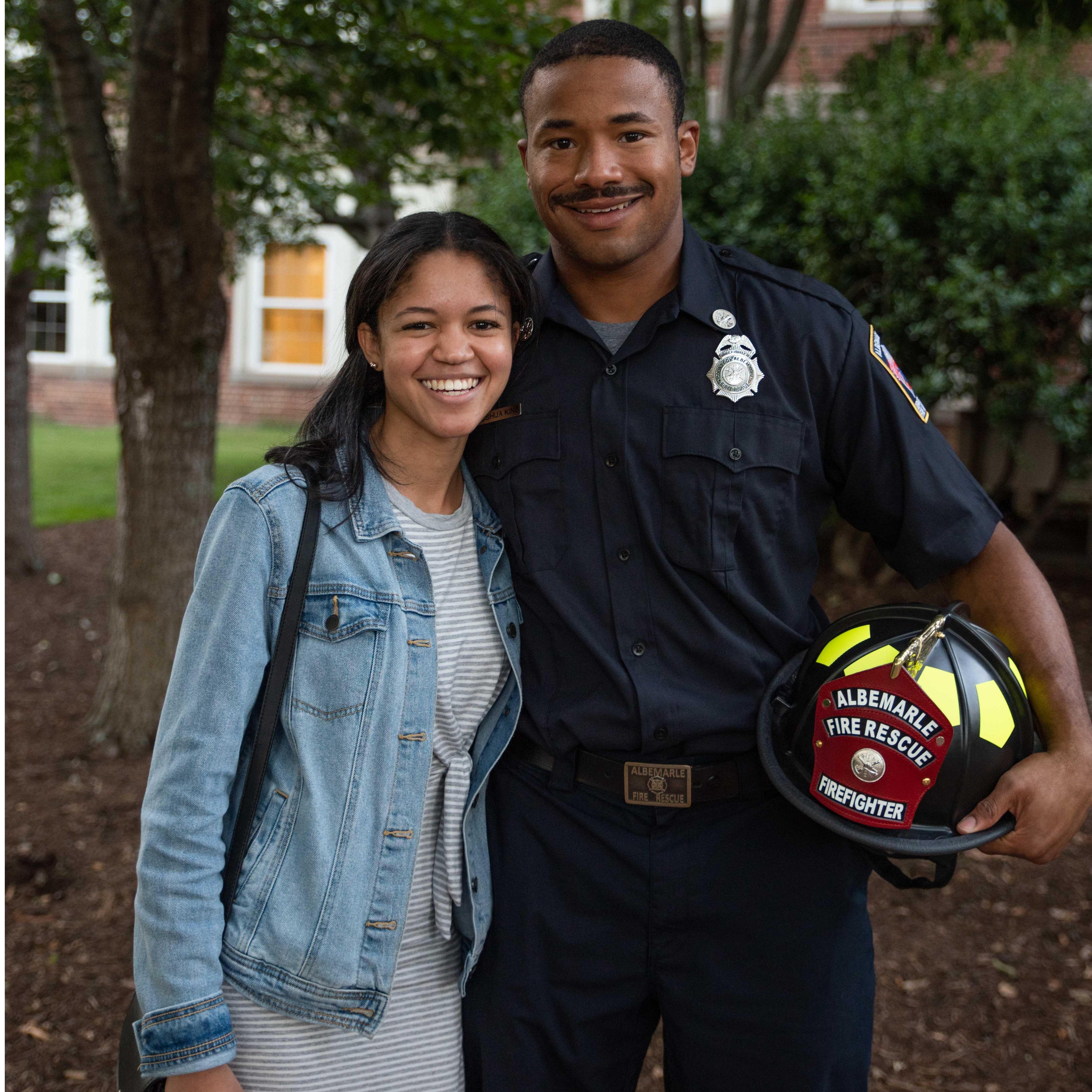 Kelly attends Joshua's Recruit School graduation. This is the day he officially became a firefighter.