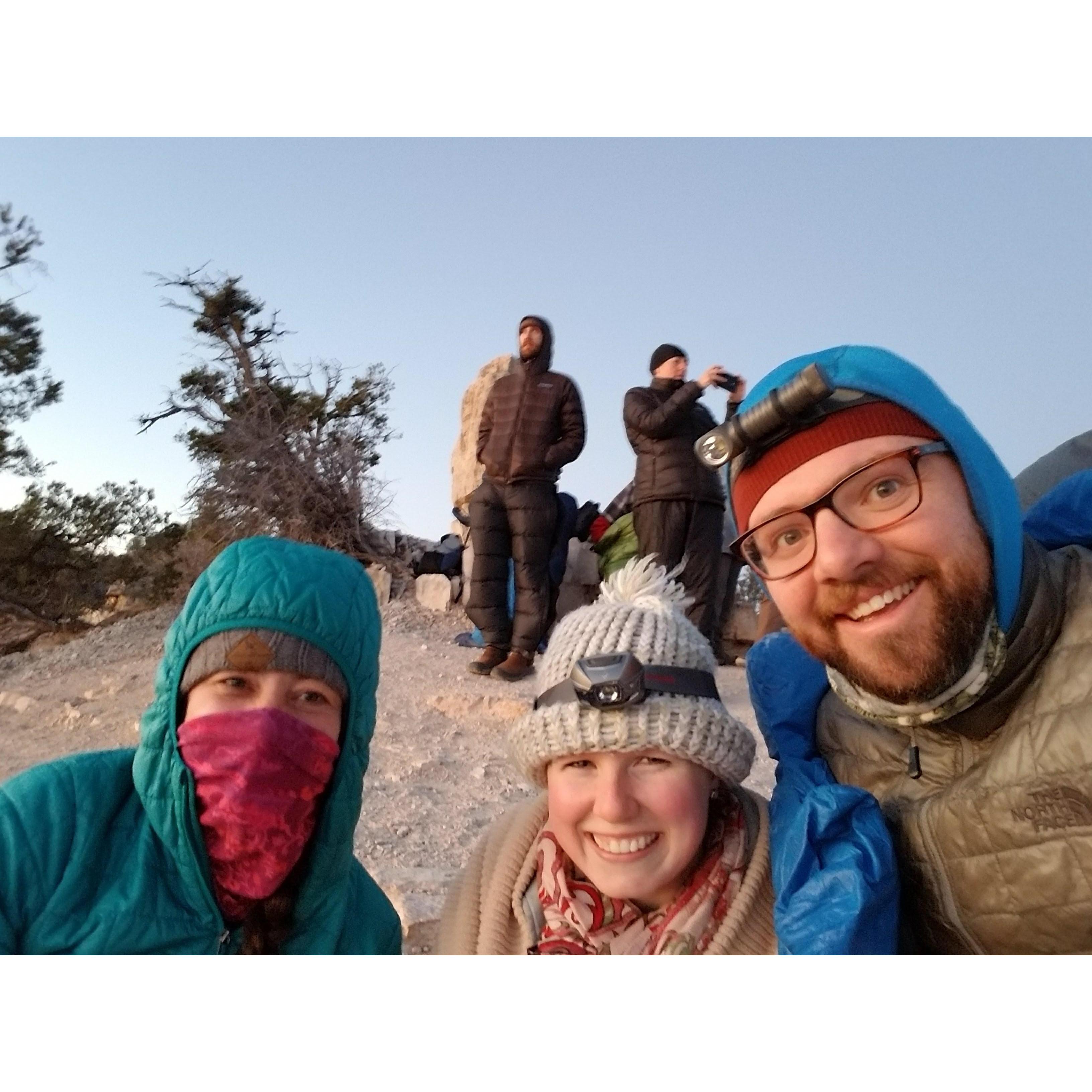 Erin, Ann, and Landis catching the sunrise at the Grand Canyon.