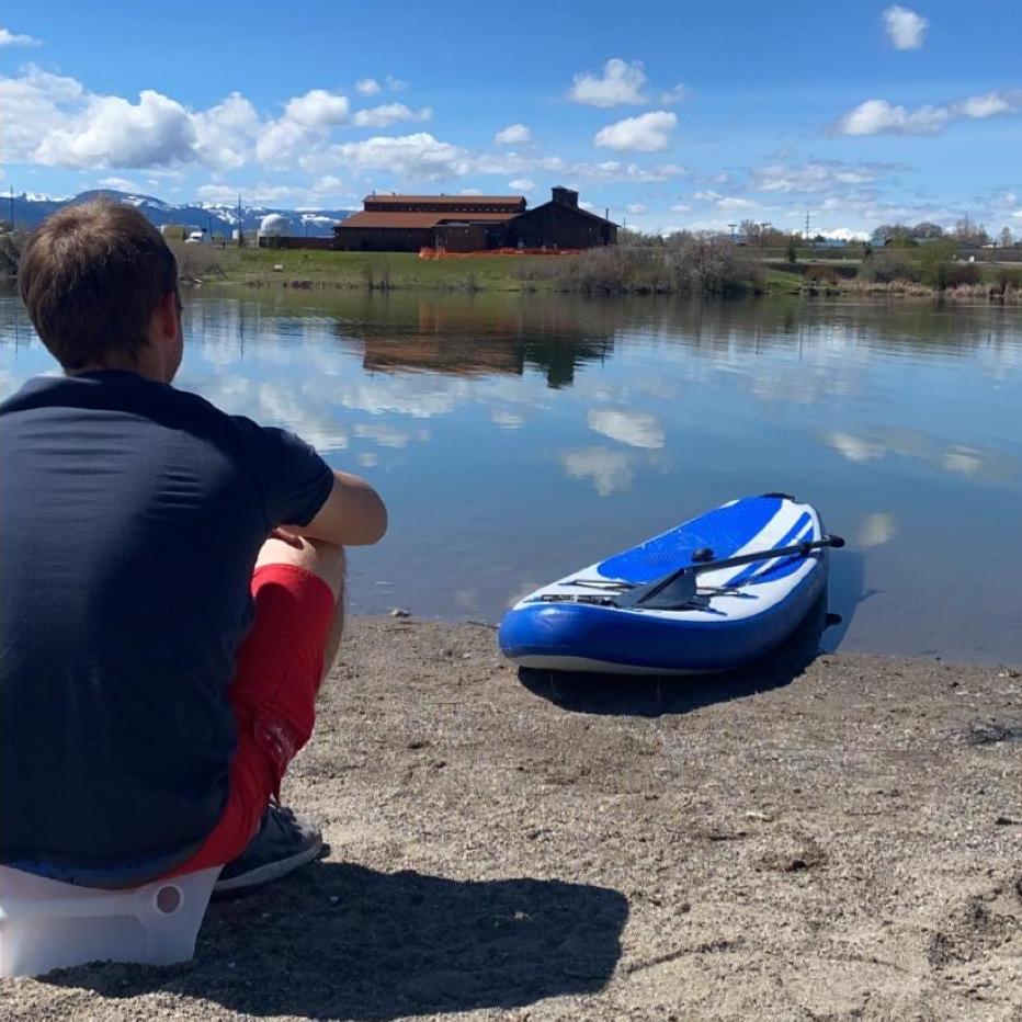 Teaching Matt how to paddle board at the Bozeman Beach!