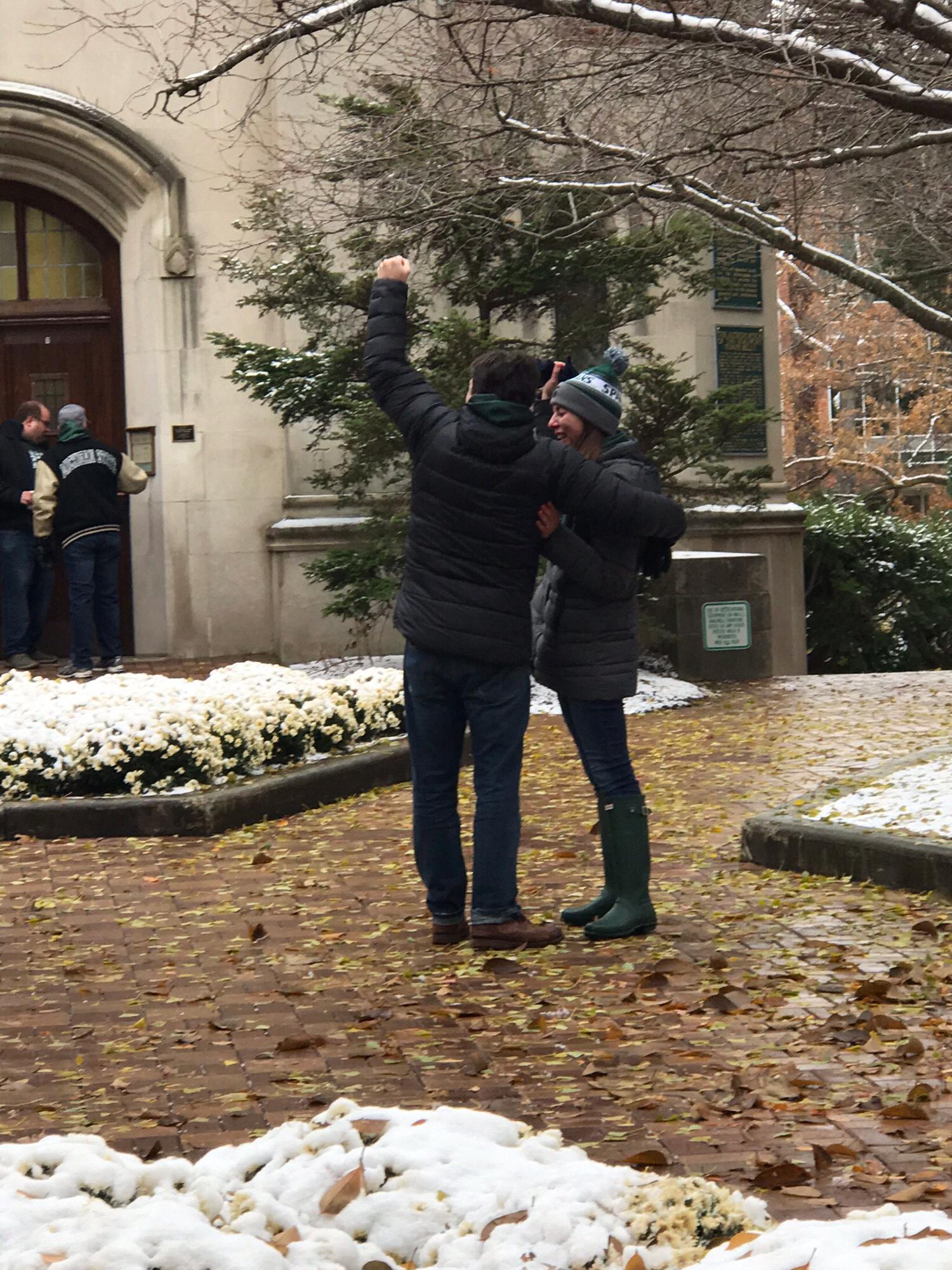 Fellow MSU football fans cheering for us.