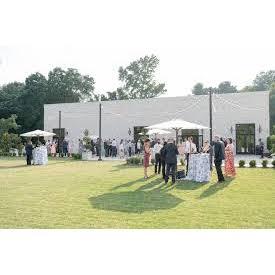 Actual photo of the venue! Theres a patio space and large yard for lawn games.