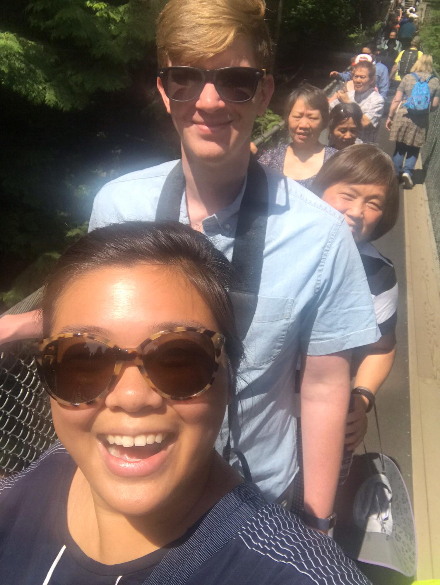 Anne and Matt are on a suspension bridge. Matt is afraid of heights but he was very brave.