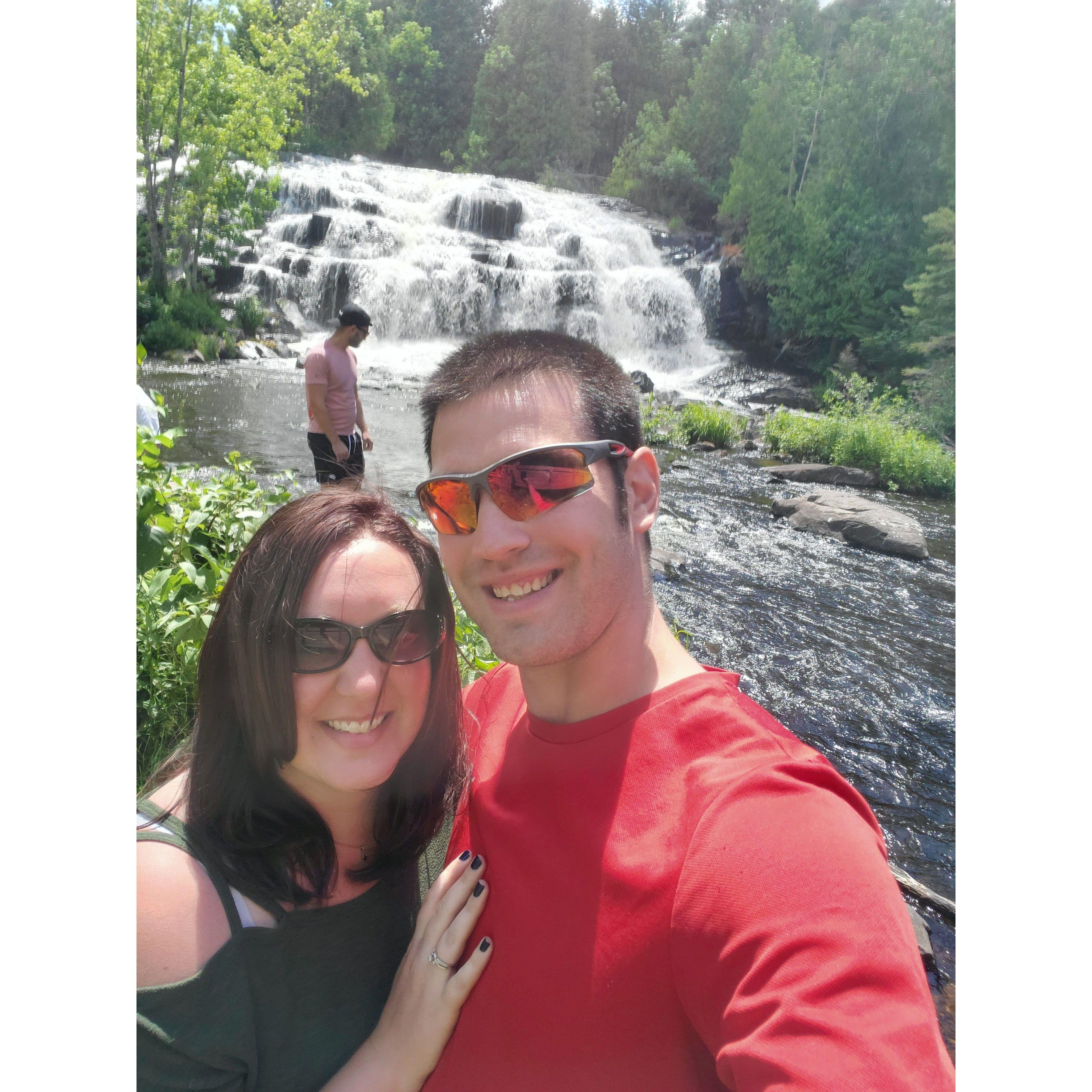 By a waterfall up in Michigan