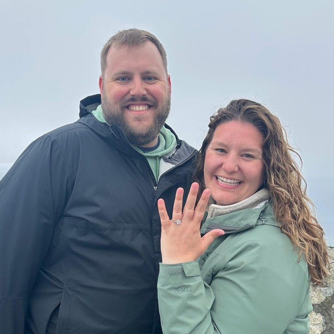 Rach & Adam got engaged at the Cliffs of Moher in Ireland exactly one year before the wedding date!