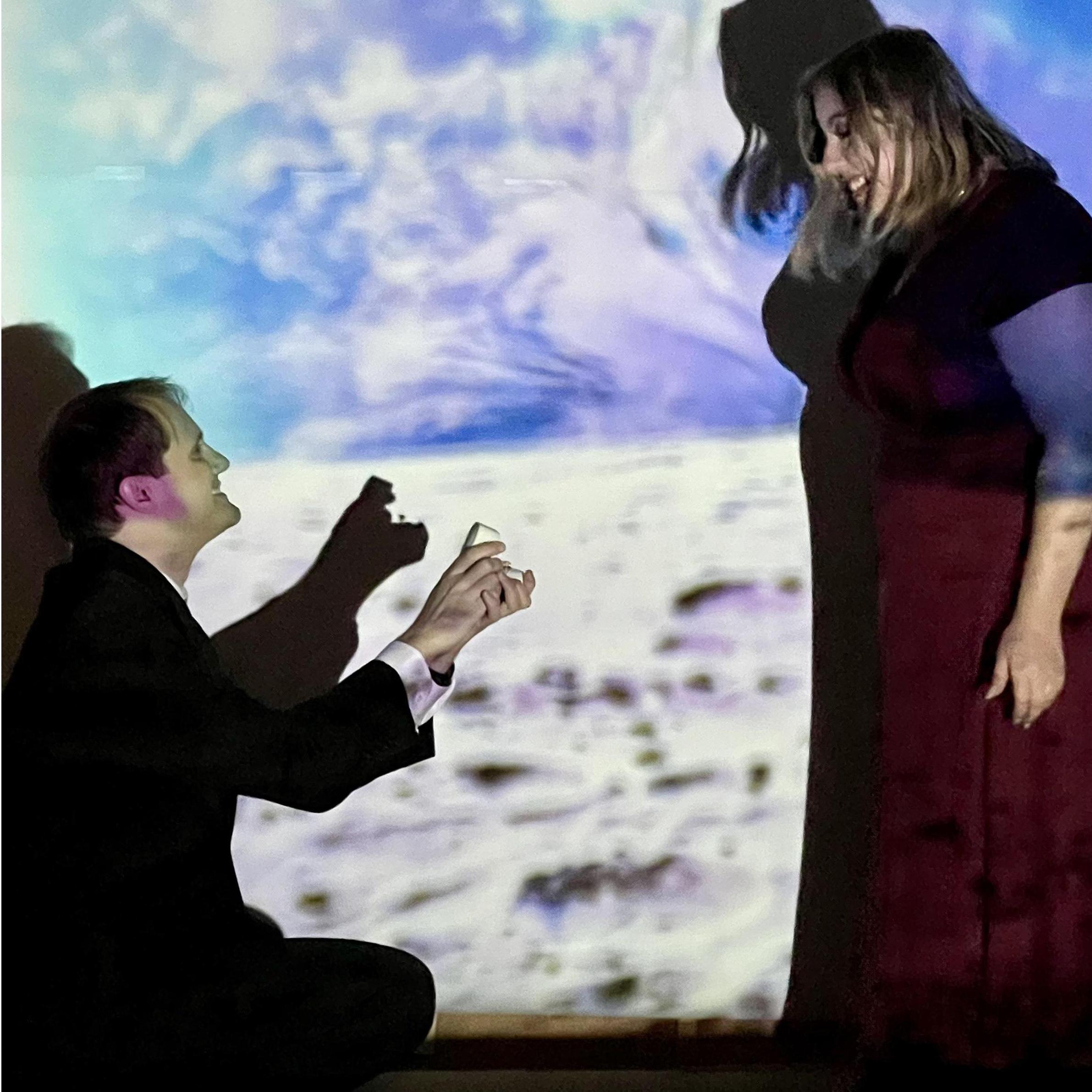 Luke proposing to Bridget.