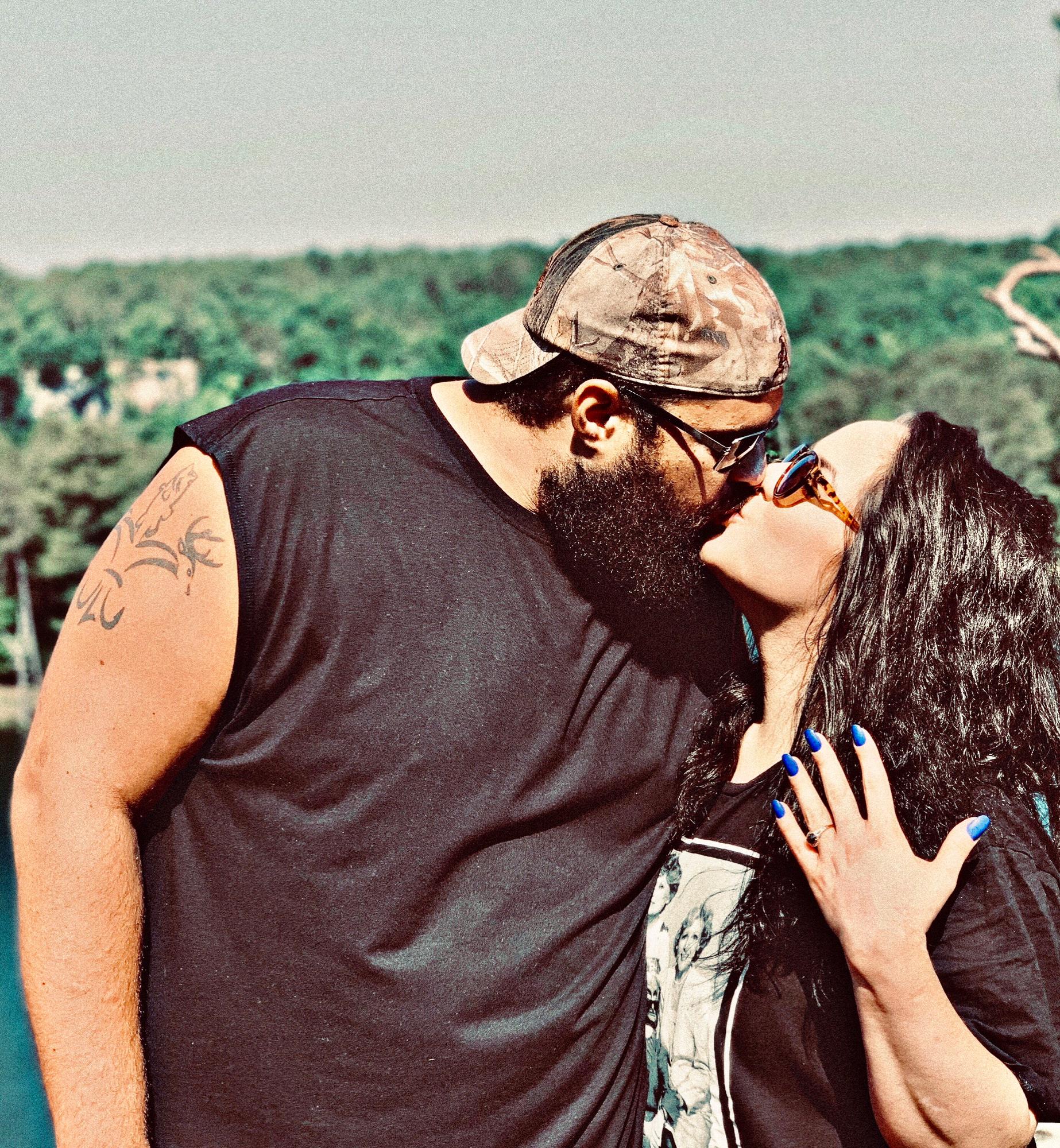 Surprise proposal on a cliff overlooking Greers Ferry Lake.. Memorial Day Weekend 2019