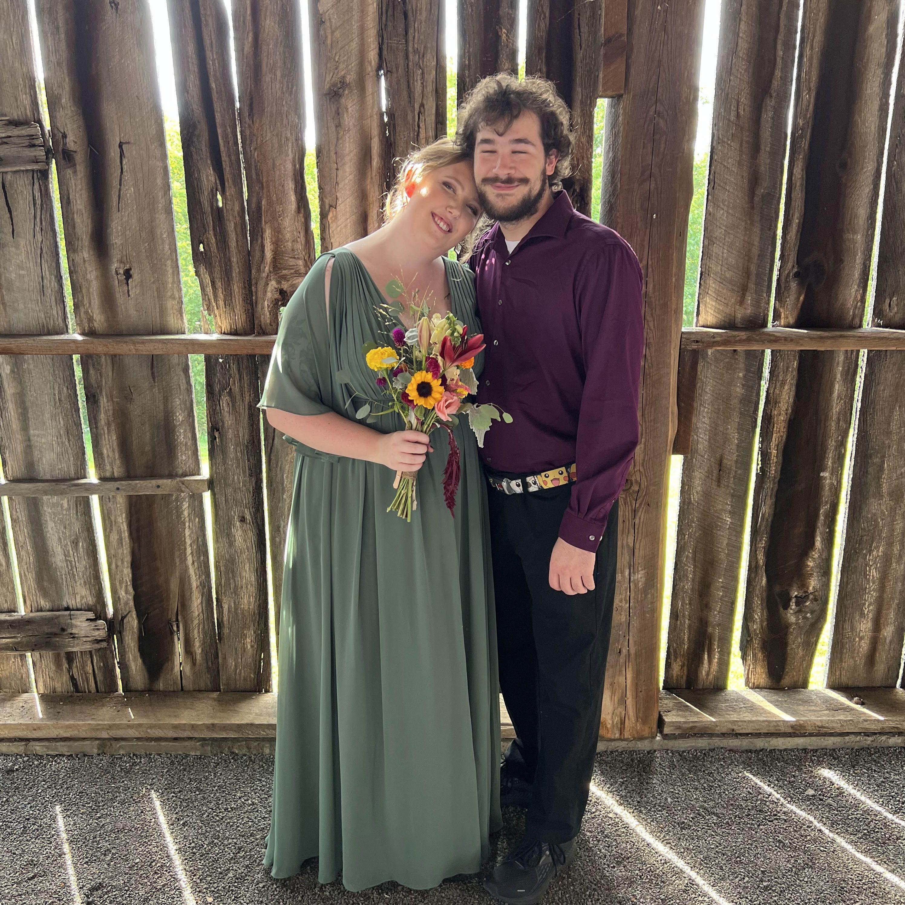 Bridesmaid and the guy who carries her shoes