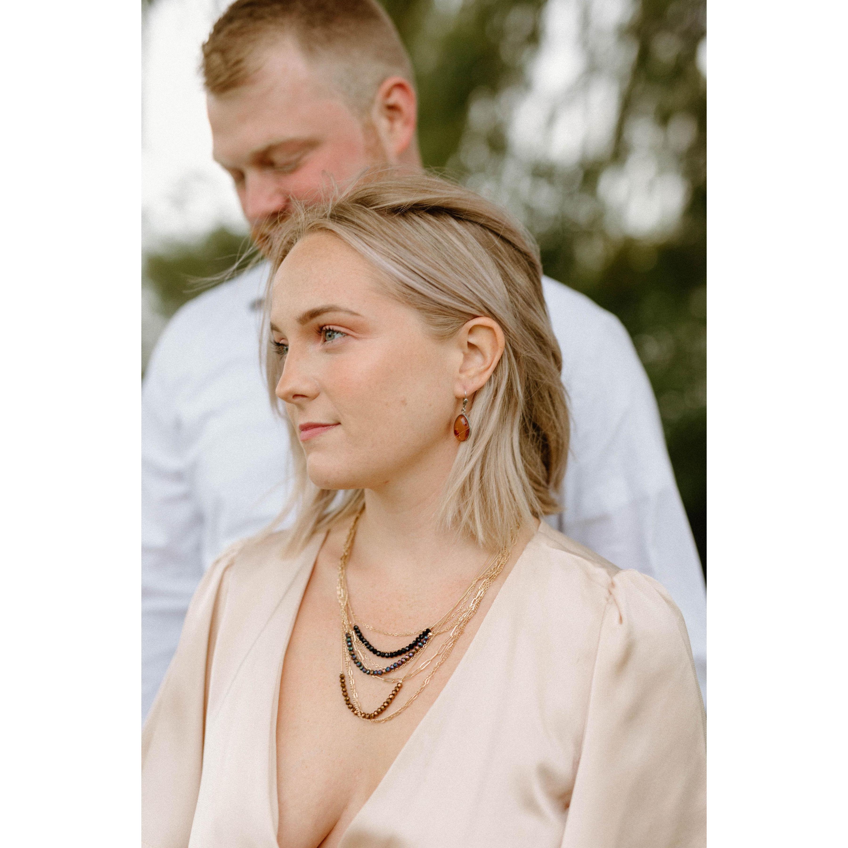 Carlie wore her grandmother's earrings for their engagement shoot