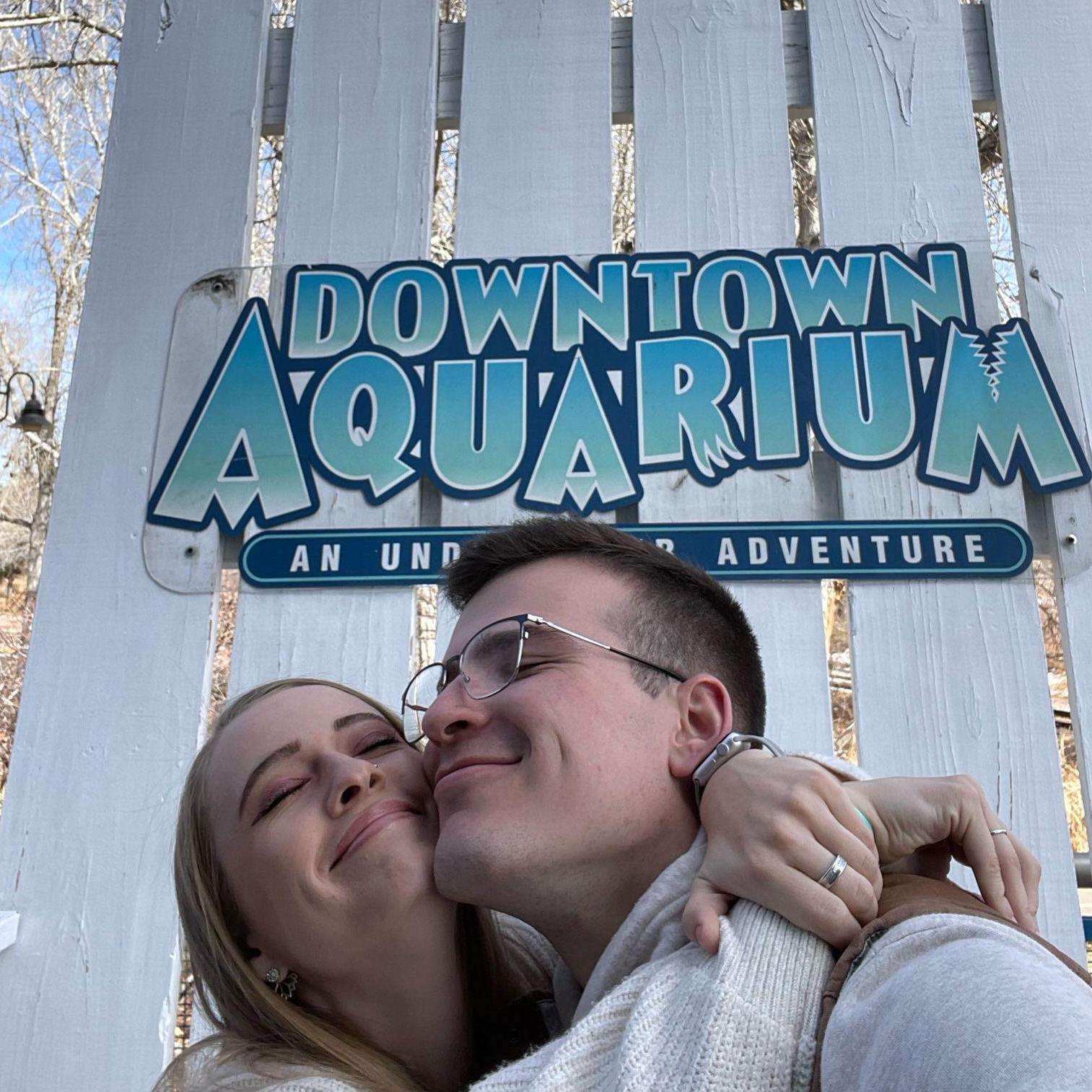 A cute candid after 8 months of dating; the fish were also pretty neat!