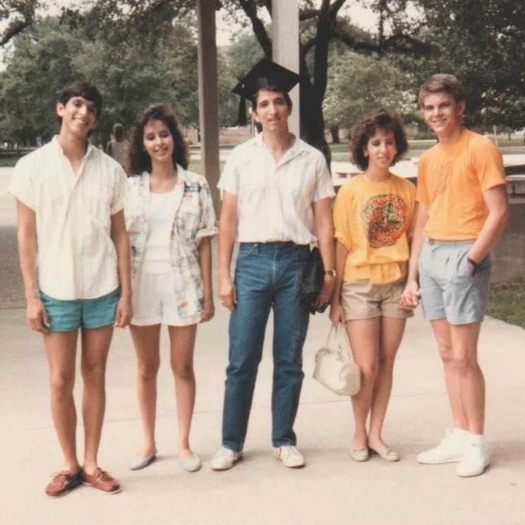 Stuart and Irene walking around Texas A&M campus with siblings after her brother's graduation.