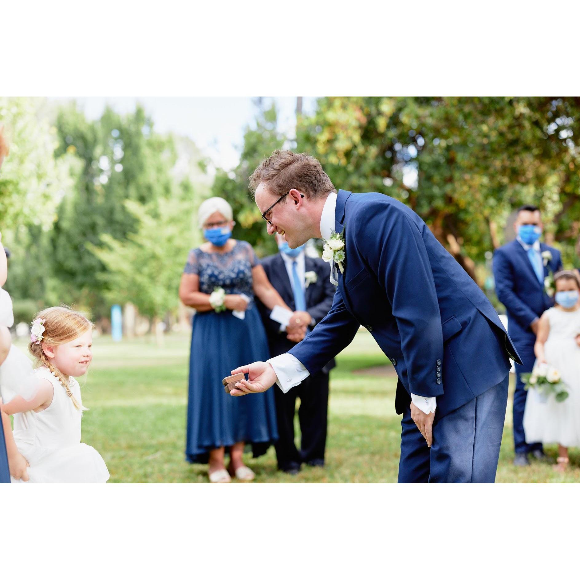 Steve receiving Rachel's ring from niece, May