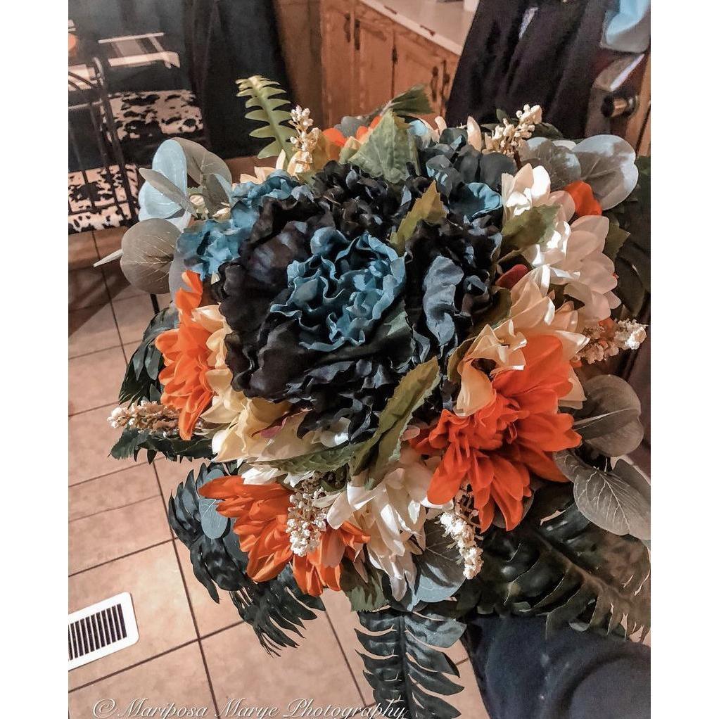 This is the bride's bouquet that she made herself. This will be at the reception.