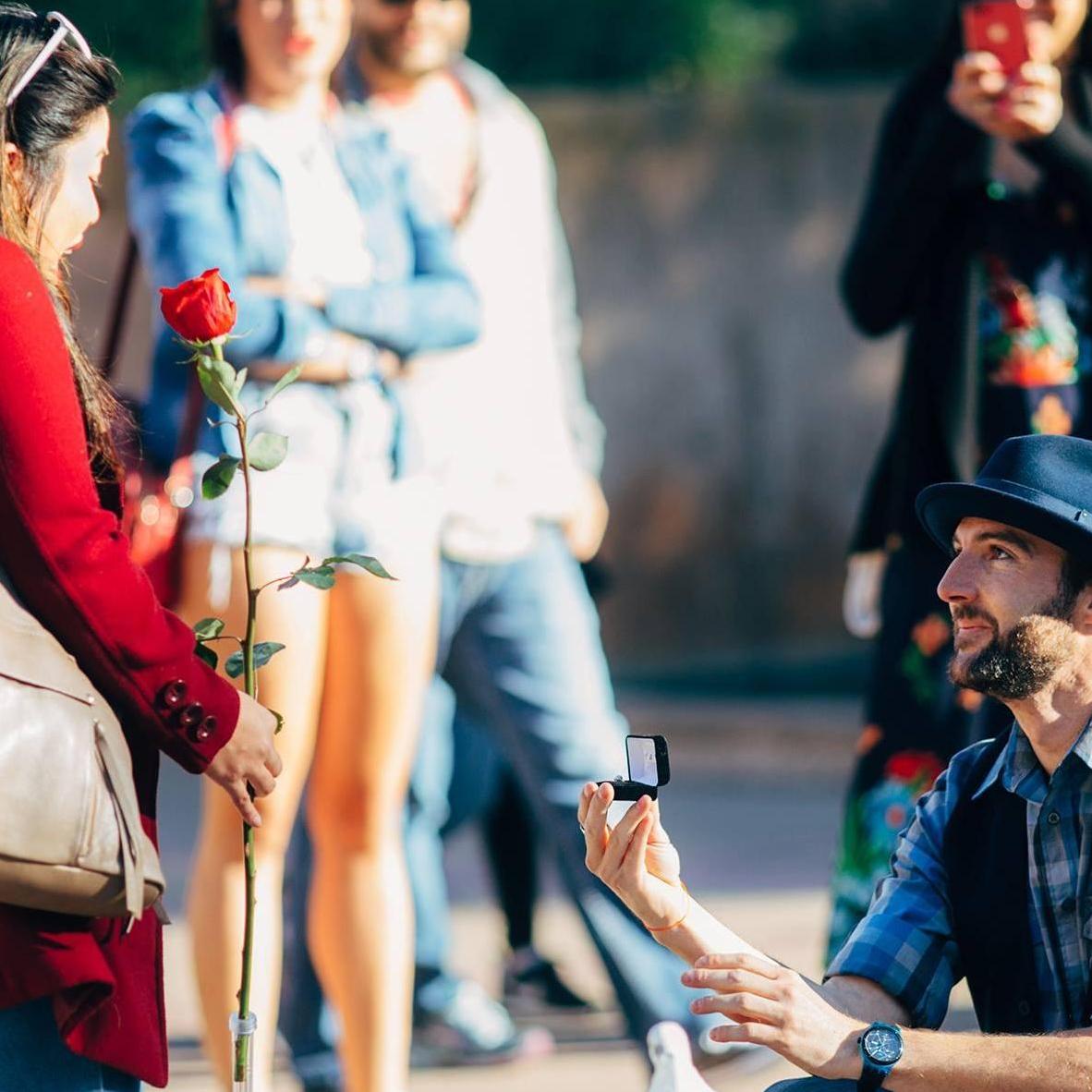 Skyler proposed at Balboa Park with the help of his friend Ralph, also known as the Man in White!