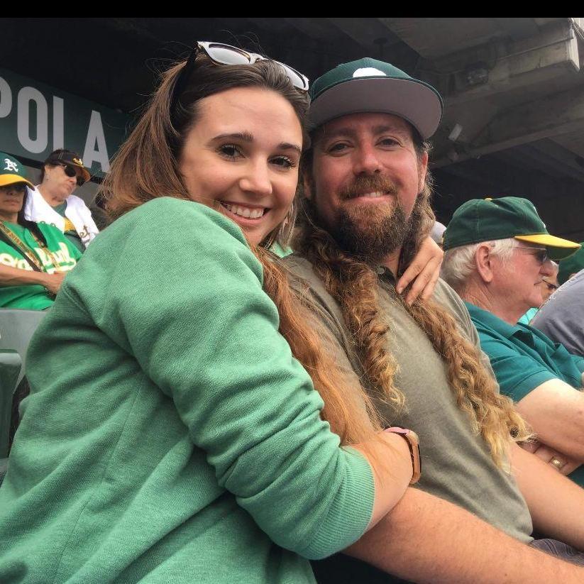 Sweet Paul treating Erica to an A's game, even though he is a die hard Dodgers fan.